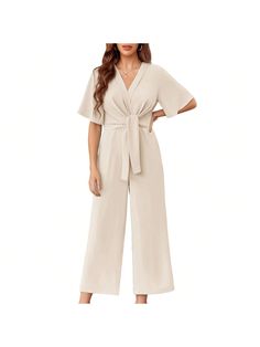 About this itemLightweight chiffon fabric shapes this elegant jumpsuit with a short dolaman sleeve, tie knot front, and plunging v-necklineA pleated cross tie front tops the flowy, loose long pants for a flattering finish. Hidden back zipperThe elasticized waist, with a self tying belt, tops straight leg pants that end in ankle-length hemsYou're sure to stand out in the crowd when you've got the flowy flutter sleeve wide leg jumpsuitSuit for travel,beach,evening,business,going out,work,street,bi Jumpsuit Suit, Tie Front Tops, Beach Evening, Wide Leg Jumpsuits, Elegant Jumpsuit, Jumpsuit Elegant, Long Romper, Travel Beach, Plain Shirts