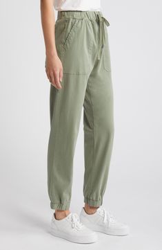 Roomy front and back pockets add convenience to these drawstring-waist joggers cut from a stretch-kissed blend of cotton and silky lyocell. 29" inseam; 11" leg opening; 11 1/2" front rise; 14" back rise (size medium) Elastic/drawstring waist Front slant patch pockets; back button-patch pockets Elastic cuffs 59% cotton, 39% lyocell, 2% spandex Machine wash, tumble dry Imported Drawstring Waist, Cotton Blend, Nordstrom, Spandex, Size Medium, Elastic