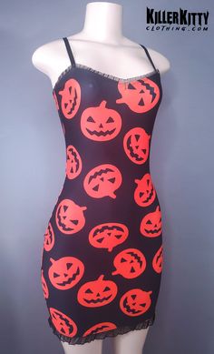 Get spooky in this cute pumpkin print dress. Black ruffle detailing on the neckline and hem and adjustable bra straps for the perfect fit. LENGTH: 24" - 26" armpit to hem. MATERIAL: Spandex Kitty Clothes, Adjustable Bra, Pumpkin Print, Cute Pumpkin, British Indian, Bra Straps, Black Ruffle, Blouse Dress, Dress Black