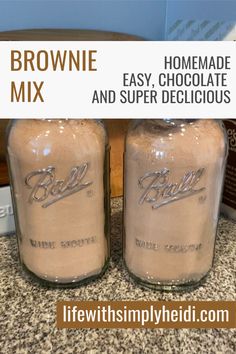 two brownie mix jars sitting on top of a counter