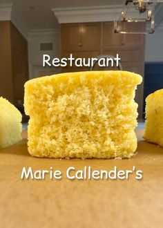 there is a piece of yellow cake on the table with words restaurant marie calender's