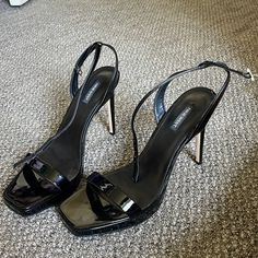 Basically Brand New, Worn Once Perfect Condition Black Platform Sandal. Weirdly Comfortable For This Height? Sleek Black Ankle Strap Sandals, Sleek Black Sandals With Pointed Toe, Sleek Black Pointed Toe Sandals, Sleek Black Closed Toe Sandals, Sleek Black Sandals With Heel Strap, Black Patent Leather Sandals In Sleek Style, Sleek Black Summer Heels, Black Patent Leather Sandals With Heel Loop, Sleek Black Square Toe Sandals