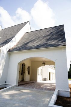 a white house with an open front door