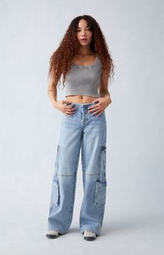 The Light Indigo Low Rise Baggy Cargo Jeans from PacSun bring together functionality and effortlessly cool style in one comfy piece. These jeans sit low on the waist and feature cargo side pockets, zipper details, and the perfect baggy fit. Y2k Cargo Jeans With Multiple Pockets For Spring, Spring Y2k Cargo Jeans With Multiple Pockets, Y2k High Rise Cargo Pants With Cargo Pockets, Y2k High Rise Cargo Pants With Pockets, Relaxed Fit Casual Cargo Pants With Zip Fly, Y2k Style Relaxed Fit Cargo Jeans, Utility Cargo Jeans For Streetwear, Utility Cargo Jeans With Zip Fly For Streetwear, Casual Medium Wash Cargo Jeans With Zip Fly