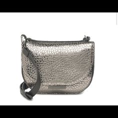 Style A Chic Look With A Metallic Croc Embossed Leather Crossbody Bag. 8" W X 7" H X 3" D 23" Strap Foldover Flap Closure Adjustable Crossbody Strap Metallic Croc Embossed Exterior With Back Slip Pocket Leather Made In Italy. Tags Attached Dust Bag Included Was A Store Display Was Handled But In Perfect Condition Evening Textured Leather Crossbody Saddle Bag, Textured Leather Crossbody Evening Bag For Everyday Use, Everyday Textured Leather Crossbody Evening Bag, Crossbody Shoulder Bag With Magnetic Closure For Shopping, Elegant Silver Shoulder Bag With Textured Leather, Evening Satchel Saddle Bag With Magnetic Closure, Chic Textured Leather Crossbody Evening Bag, Chic Silver Leather Bag, Chic Textured Leather Saddle Shoulder Bag