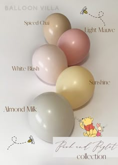 four balloons with winnie the pooh characters on them, all in different colors and sizes