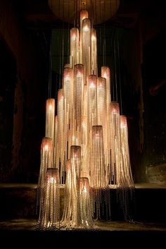 a large chandelier made out of bottles