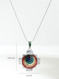 A .950 sterling silver chakana-shaped pendant showcases seven circular chakra colors. Includes such stones and shells as chrysocolla, lapis, spondylus, and mother of pearl. Handcrafted in Cuzco, Peru. Chakra Colors, Chakra Pendant, Chakra Necklace, Peru, Mother Of Pearl, Chakra, Shells, Sterling Silver, Stone