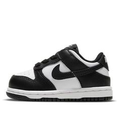 Best gifts for newborns/babies! The Nike Dunk Low TD Black White is a toddlers shoe that features a classic black and white colorway. It is made with leather and has a white base with black overlays. The Swoosh branding is black, and the shoe has a lightly padded nylon tongue. The tooling is two-toned, with a rubber outsole that draws from the Air Jordan 1 for traction. (SNKR/Skate/Light/Low Top) Baby Boy Shoes Nike, Baby Jordan Shoes, Black Skate Shoes, Nike Shoes For Boys, Nike Kids Shoes, Toddler Nike Shoes, Gifts For Newborns, Baby Jordans, Baby Nike