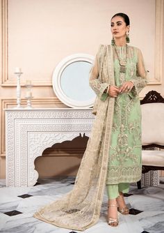 Pistachio Embroidered Pakistani Salwar Suit Dupatta Salwar Kameez is stunning ensemble adorned with exquisite floral embroidered creating a timeless design. Intricate designs and fine details of thread make this beautiful Pakistani Salwar Kameez Suit an epitome of beauty and whimsical grace. Embroidered Kameez: The perfectly crafted kameez is adorned with intricate embroidery on the front, and sleeves making the elegant design. The neckline and sleeves are alluring with embroidered patch details Neckline Finishing, Net Sleeves, Dupatta Border, Asian Designers, Pakistani Salwar, Raw Silk Fabric, Organza Sleeves, Pakistani Salwar Kameez, Embroidered Organza