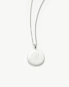 Engravable Round Necklace | Sterling Silver. Make It Personal with a Necklace. Paired with a Delicate Chain, the Smooth Clip-On Pendant Can be Engraved on Both Sides – the Perfect Gift for that Special Someone. Opt for the Engravable Round Disc Pendant. Please Note: Engraving Items May Take 7-10 Working Days to Process. Pendant Metal: Sterling Silver Pendant Dimensions: 15mm Short Plain Chain: Total Length 450mm with Extension Links at 410mm, 430mm and 450mm Weight: 4. 3 Gproduct Code: En-S-N1-Ns Round Sterling Silver Charm Necklace With Engraving, Sterling Silver Round Pendant Charm Necklace With Engraving, Silver Engraved Chain Necklace With Round Pendant, Silver Engraved Round Pendant Charm Necklaces, White Engraved Round Pendant Charm Necklace, Double Chain Bracelet, Fan Necklace, Malachite Necklace, Leaf Bracelet