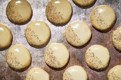 some cookies are sitting on top of a baking sheet and have sprinkled with seasoning