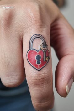 Heart lock and key tattoo, representing love and security Heart Shaped Lock Tattoo, Heart Lock And Key Tattoo, Heart Finger Tattoo, Lock And Key Tattoo, Lock Key Tattoos, Finger Tattoo Ideas, Traditional Heart Tattoos, Heart Tattoo On Finger