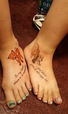 two people with tattoos on their feet and one has a fox tattoo on the foot