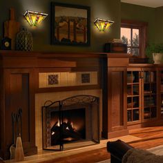 a living room filled with furniture and a fire place