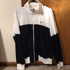 This Nike Full Zip Jacket Has Never Been Worn! It Is In Brand New Like Condition! It Is White And Navy Blue Nike Cotton Track Jacket For Fall, White Hooded Nike Outerwear, Nike Cotton Long Sleeve Track Jacket, Nike Casual Navy Track Jacket, Casual Navy Nike Track Jacket, White Cotton Track Jacket For Fall, White Cotton Track Jacket For Spring, White Long Sleeve Track Jacket For Spring, White Long Sleeve Sports Outerwear