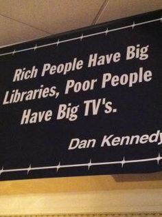 a sign that says rich people have big librarians, poor people have big tv's