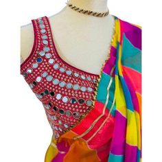 Contemporary multi colored saree that fits any occasion. Ideal as festive wear, wedding wear, casual or cocktail dine in.  this 5.5 meters of elegance as beautiful detailing with exclusive Gota Patti work from Rajasthan to enhance the look. The leightweight and soft material makes it very easy to drape and carry. Comes with very contemporary unstiched blouse material which can be mix and matched with other outfits. Multicolor Choli With Traditional Drape For Party, Multicolor Traditional Drape Choli For Party, Multicolor Choli For Party With Traditional Drape, Festive Multicolor Party Dupatta, Multicolor Chanderi Blouse Piece With Gota Work, Chanderi Blouse Piece With Gota Work In Multicolor, Multicolor Choli With Gota Work For Festivals, Festive Multicolor Georgette Blouse Piece, Multicolor Saree With Zari Work For Navratri