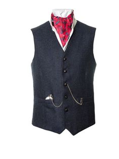 Ryan | Men's Navy Tweed Waistcoat Complement our Ryan tweed jacket with one of our Ryan tweed waistcoats. This navy tweed waistcoat is a timeless investment piece. This navy tweed fabric has been expertly handwoven and made into a true piece of Irish design. This waistcoat can be styled with casual suits, sports jackets, and with business wear. It is handmade by our expert tailors in Balbriggan, North Co. Dublin. This navy colour offers the wearer versatility and adds a pop of navy colour to a c Formal Tailored Tweed Vest, Tailored Tweed Vest For Formal Occasions, Elegant Tweed Business Vest, Elegant Tweed Vest For Business, Formal Tweed Vest For Winter, Formal Winter Tweed Vest, Elegant Tweed Vest For Formal Occasions, Elegant Formal Tweed Vest, Wedding Vest