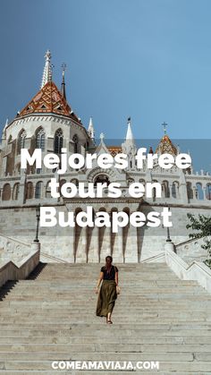 a woman walking up some steps with the words melores free tours en budapest