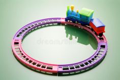 a toy train is on the track with other toys around it royalty images and stock photos