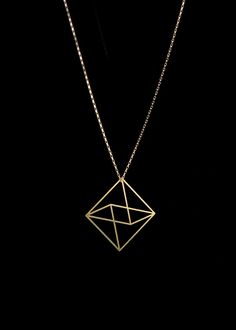 The Octahedron pendant is part of The Edges Collection. Inspired by a simple line drawing, the two-dimensional octahedron shape creates the illusion of geometry in three dimensions. The visual ambiguity results in wearable art that is light and minimal, understated yet unique. Available as either 14K gold-plated with a gold-filled chain or stainless steel with a sterling silver chain. All chains are 18". The Edges collection is created through a process of photochemical etching. Minimalist Geometric 14k Gold Jewelry, Minimalist Geometric Jewelry In 14k Gold, Minimalist 14k Gold Geometric Jewelry, Geometric Minimalist Formal Jewelry, Modern Diamond-shaped Necklace As Gift, Modern Diamond-shaped Necklace As A Gift, Modern Diamond-shaped Necklace For Gift, Geometric 14k Gold Jewelry, Minimalist Pyramid-shaped Jewelry For Gifts