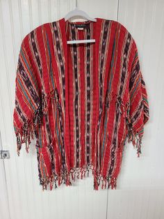 "This is in good condition! It measures 35\" long x 24 1/4\" shoulder to shoulder wide, with 12\" l sleeves, that are 7 5/8\" w. Please feel free to ask me any questions. Thanks." Lightweight Long Red Outerwear For Beach, Red Summer Beach Outerwear, Long Red Beach Outerwear, Red Folk Style Spring Outerwear, Multicolor Cotton Outerwear For Summer, Red Folk Cotton Outerwear, Red Summer Outerwear With Kimono Sleeves, Red Bohemian Outerwear For Festival, Red Bohemian Festival Outerwear