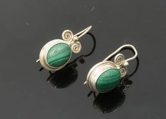 "SAJEN 925 Silver - Vintage Cabochon Malachite Swirl Drop Earrings - EG10056  SAJEN 925 Silver - Vintage Cabochon Malachite Swirl Drop Earrings - EG10056  Jewelry Type:         Earrings   Metal Type:            925 Silver  Metal Size:             1\"  Stone Type:            Malachite   Condition:              N/A  Jewelry Weight:     5.5 Grams  PLEASE NOTE: THIS ITEM IS PRE-OWNED. ALTHOUGH MOST ITEMS ARE IN VERY GOOD CONDITION, SOME MAY NEED CLEANING AND/OR MINOR REPAIRS. WE MAKE A VERY STRONG EFFORT TO UPLOAD CLEAR PICTURES. PLEASE INSPECT ALL PICTURES AND ASK ALL QUESTIONS YOU MAY HAVE PRIOR TO MAKING A PURCHASE. NOT ALL STONES ARE GENUINE, SOME ARE ENHANCED OR CREATED." Traditional Sterling Silver Cabochon Earrings, Vintage Metal Cabochon Earrings, Vintage Formal Clip-on Cabochon Earrings, Vintage Green Cabochon Earrings, Vintage Malachite Jewelry Gift, Vintage Cabochon Clip-on Earrings, Clear Pictures, Earrings Metal, All Pictures