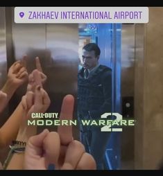 two people giving the middle finger sign in front of an elevator with text that reads call duty modern warre