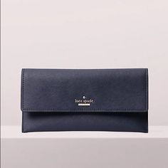 Nwt Brand: Kate Spade Style: Cameron Street Harling Envelope Wallet Color: Blazer Blue Material Crosshated Leather With Matching Trim Bookstripe Printed On Poly Twill Lining Elegant Blue Evening Wallets, Elegant Evening Blue Wallets, Elegant Trifold Bag With Card Slots, Elegant Blue Wallets With Interior Card Slots, Chic Envelope Travel Wallet, Chic Travel Envelope Wallet, Elegant Blue Wallets, Classic Blue Clutch For Travel, Classic Blue Travel Clutch