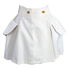 Vivienne Westwood Iconic White Twill Skirt with signature faux horn buttons. Full circle skirt wrapped mini with large faux flap pockets and back vent. Size 42 IT, 6 US, 10 UK Fully lined. 1990's UK. Waist is approx 26-27", 3" width, Skirt Length 15". Vivienne Westwood Skirt, Vivienne Westwood Tops, Twill Skirt, Red Label, Full Circle Skirts, Circle Skirt, White Skirts, Vivienne Westwood, Skirt Length