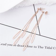 Sweep through your day in style when you don these swinging drop earrings plated with luxurious 18-karat rose gold. 0.31" W x 2.24" L 18k rose gold-plated steel Elegant Rose Gold Stainless Steel Earrings, Rose Gold Stainless Steel Earrings For Pierced Ears, Modern Rose Gold Dangle Earrings, Rose Gold Metal Dangle Earrings, Drop Earring, 18k Rose Gold, Rose Gold Plates, Bobby Pins, Arrow Necklace