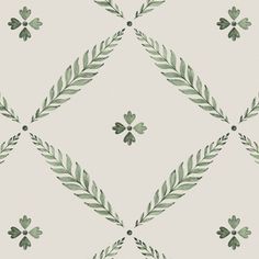 a green and white wallpaper with leaves