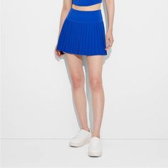 Women's Game Day Pleated Skort - Joylab Blue Small Nwt Athleisure Tennis Skirt Mid-Rise Pleated Skort Built-In Shorts Stretchy Fabric With Lining Athletic Fit Pull-On Style Recycled Polyester Product Details This Pleated Skort From Joylab In An Athletic Fit Is Designed With Built-In Fitted Shorts To Offer Additional Coverage. The Midweight Flexible Fabric With Soft Lining Lends Comfort And Freedom Of Movement Through Any Activity, While The Pull-On Style Allows For Easy Wear. Pair With A Range O Casual Spring Sports Pleated Skirt, Stretch Pleated Skirt For Sports, Spring Season, Stretch Pleated Workout Bottoms, Casual Pleated Skirt For Sports In Summer, Casual Summer Pleated Skirt For Sports, Blue Athleisure Tennis Skirt For Spring, Blue Athleisure Tennis Skirt, Blue Workout Skort For Summer, Sporty Short Blue Tennis Skirt