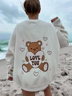 Teddy Bear Embroider Sweatshirt – Sunkissedcoconut Playful White Sweatshirt With Character Print, Cute White T-shirt With Bear Design, Oversized White Kawaii Sweatshirt, Cute White Sweatshirt With Cartoon Print, White Kawaii Sweatshirt With Graphic Print, Casual White T-shirt With Bear Design, Casual White Sweatshirt With Cartoon Print, Cute Sweatshirt With Funny Print And Crew Neck, Cute Crew Neck Sweatshirt With Funny Print