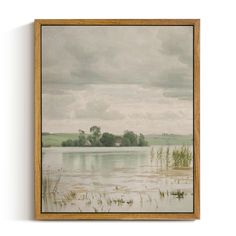 a painting hanging on the wall above a lake