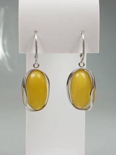 Big white Amber earrings - 1 pair.. Natural butterscotch Baltic Amber. Each pair can be slightly difderent colour due to amber is being natural. Handmade earrings. Sterling silver 925, with stamps. Earrings length about 4 cm. A matching pendant is also available. Butter Scotch, Earrings Hanging, Amber Earrings, Gift For Mother, Amber Jewelry, Baltic Amber, Jewelry Handmade, Handmade Earrings, Scotch