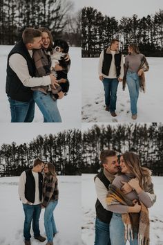 a couple holding their dog in the snow