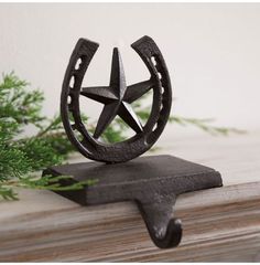 a metal star on top of a wooden shelf