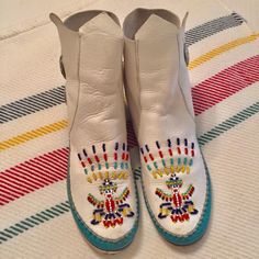 Vintage Native American Concho Beaded Ankle Moccasin, Off White And Green Leather Ankle Concho Moccasin, Really Good Condition For Age And Wear, I Bought White Leather Ties For These,No Size On Moccasins But I Measured Sole At Exactly 10 Inches, Rare And Beautiful. White Embellished Boots With Round Toe, White Moccasins With Leather Sole And Flat Heel, White Moccasins With Flat Leather Sole, White Bohemian Boots With Round Toe, Navajo Moccasins, Powwow Beadwork, Native American Moccasins, American Shoes, Beaded Moccasins