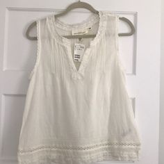 Nwt Cotton And Lace Top In Cream Size 8 From H & M Beautiful Lace Runs Along The Neck And Notched Deep V As Well As Arms And The Bottom Check It Out! H&m V-neck Tops For Daywear, H&m Summer Beach Tops, H&m Sleeveless Beach Tops, H&m Cotton Top For Vacation, White H&m Tops For The Beach, H&m White Beach Top, White H&m Beach Top, H&m Blouse For Beach Wear In Spring, H&m Spring Beach Blouse