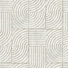 an abstract white tile pattern with wavy lines