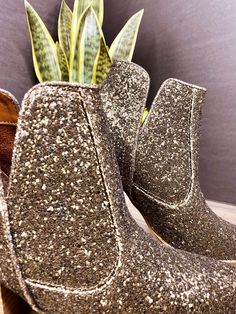 NOTHING quite says 'I'm here for the party' like a pair of glitter booties. Rubber heel and sole. 3 inch heel Fit true to size, if you are in between sizes, go with your larger size. If your foot is wide at all, also size up. Athleisure Tops, Waterproof Jewelry, 3 Inch Heels, Denim Leggings, Romper Dress, Rubber Heels, Outerwear Women, Hat Hairstyles, Ankle Booties