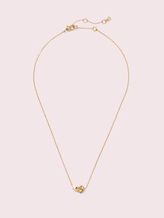 we designed this loves me knot necklace as an update to our best-selling sailor's knot. if you take a second look, you might notice the knotted pendant resembles a heart. it's a nod to one of our favorite (and sweetest) emblems. | Kate Spade Loves Me Knot Mini Pendant, Gold Sailor Knots, Bracelet Online, Knot Necklace, All That Glitters, Mini Pendant, Kate Spade New York, Kate Spade, Gold Necklace, Jewelry Bracelets