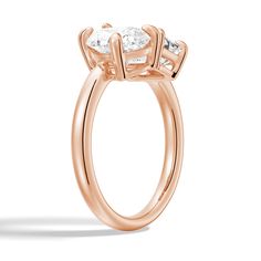 three stone engagement ring in 18k rose gold