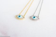 "Dainty with lots of sparkle evil eye necklace. .925 sterling silver Delicate evil eye necklace available in sterling silver or gold plated silver. Comes with a mother of pearl in the middle and cubic zirconia around. Length 16\" plus 2\" more for extension" Silver Evil Eye Necklace In 14k Gold, 14k Gold Silver Evil Eye Necklace, Silver 14k Gold Evil Eye Necklace, Silver 14k Gold Necklace With Evil Eye, Sterling Silver Evil Eye Necklace For Everyday, Dainty Sterling Silver Evil Eye Necklaces, Elegant Silver Evil Eye Charm Necklace, Dainty Sterling Silver Evil Eye Necklace, Elegant Everyday Necklace With Evil Eye