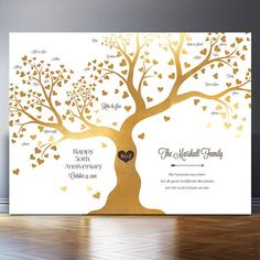 an anniversary card with a tree and hearts on it