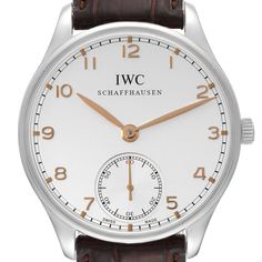 IWC Portuguese Silver Dial Manual Steel Mens Watch IW545408. Manual winding movement. Stainless steel case 44.0 mm in diameter. Exhibition transparent sapphire crystal case back. . Scratch resistant sapphire crystal. Silvered dial with recessed small seconds sub-dial at 6 o'clock. Rose gold Arabic numerals and leaf shaped hands. Minute markers around the outer rim. Brown leather strap with stainless steel deployant clasp. White Watches With Diamond Hour Markers, Classic White Chronograph Watch With Round Dial, White Chronograph Watch With Round Dial, Classic Silver Chronograph Watch, White Chronograph Watch With Chronometer For Formal Occasions, White Chronograph Watch With Chronometer For Formal Events, White Classic Chronograph Watch, White Timeless Chronograph Watch For Business, Formal White Chronograph Watch With Chronometer