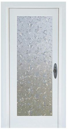 a white door with frosted glass on it