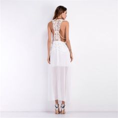 White Long O-Neck Lace Beach Maxi Dress - Uniqistic.com Flowy V-neck Backless Dress For Beach, Casual Backless V-neck Dress For Vacation, Chic V-neck Backless Dress For The Beach, Summer Beachwear Backless Dress For Beach Cover-up, Spring Sundress For Beach Wedding, Chic Sleeveless Backless Dress For Beach, Sleeveless Maxi Dress For Beach Wedding In Spring, Casual Maxi Dress For Beach Wedding, Beachy Summer Party Maxi Dress